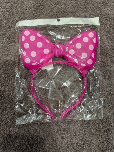 ABC Trading toy recall image showing packaged pink bow children’s toy headband