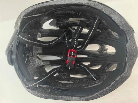 Interior view of recalled Favoto H-1 bicycle helmet showing strap and padding system