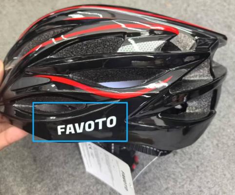 Side profile of recalled black Favoto bicycle helmet with red accents included in CPSC recall