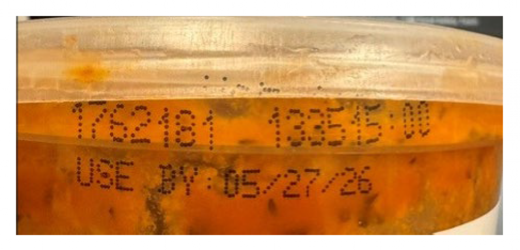 Whole Foods Minestrone Soup Recall product cup showing lot code and use-by date on the top rim