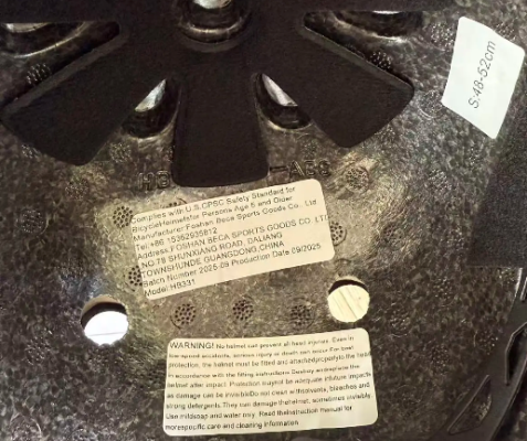 Label inside recalled multi-purpose helmet showing model and manufacturer information