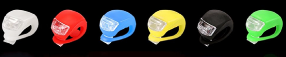 Qumeney Bicycle Light recalled product close-up showing accessible button cell battery compartment that poses ingestion hazard